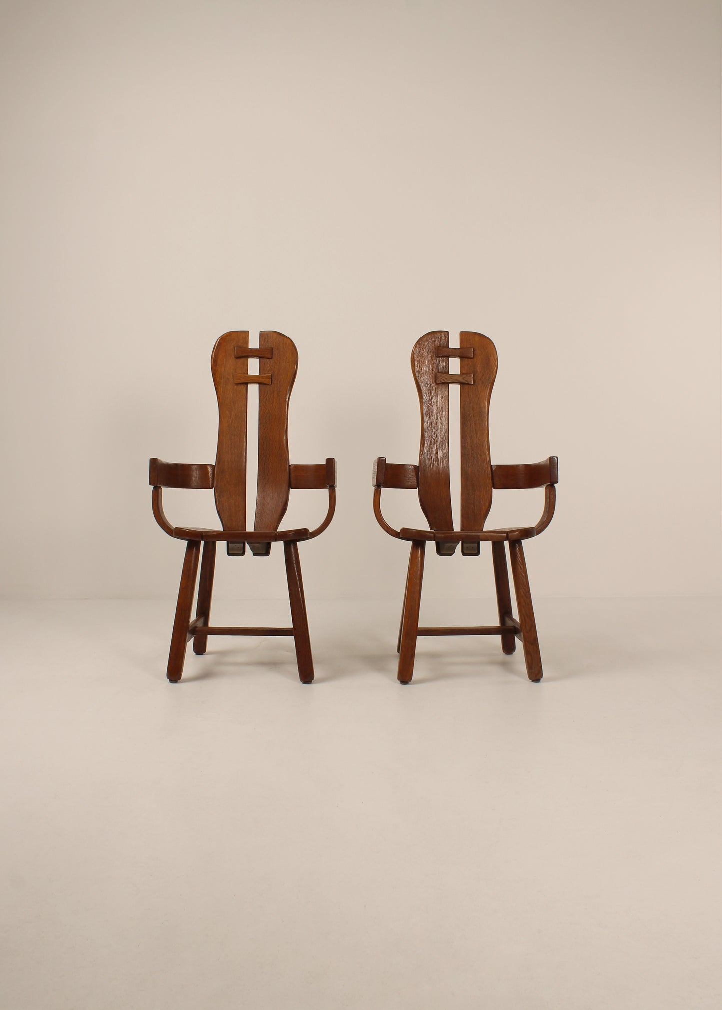Pair of oak De Puydt dinging chairs with arms, Mid - Century