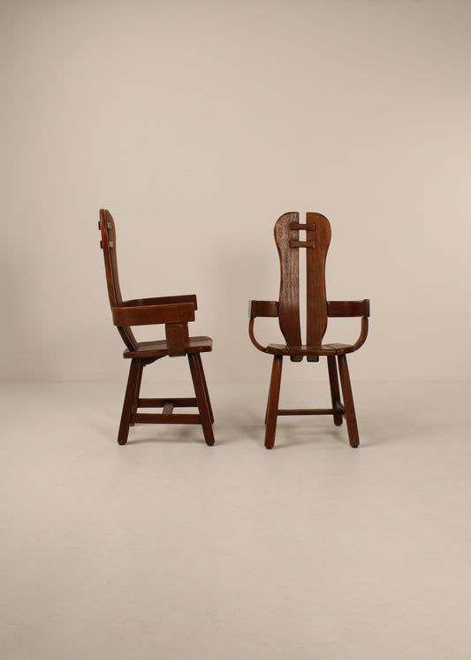Pair of oak De Puydt dinging chairs with arms, Mid - Century