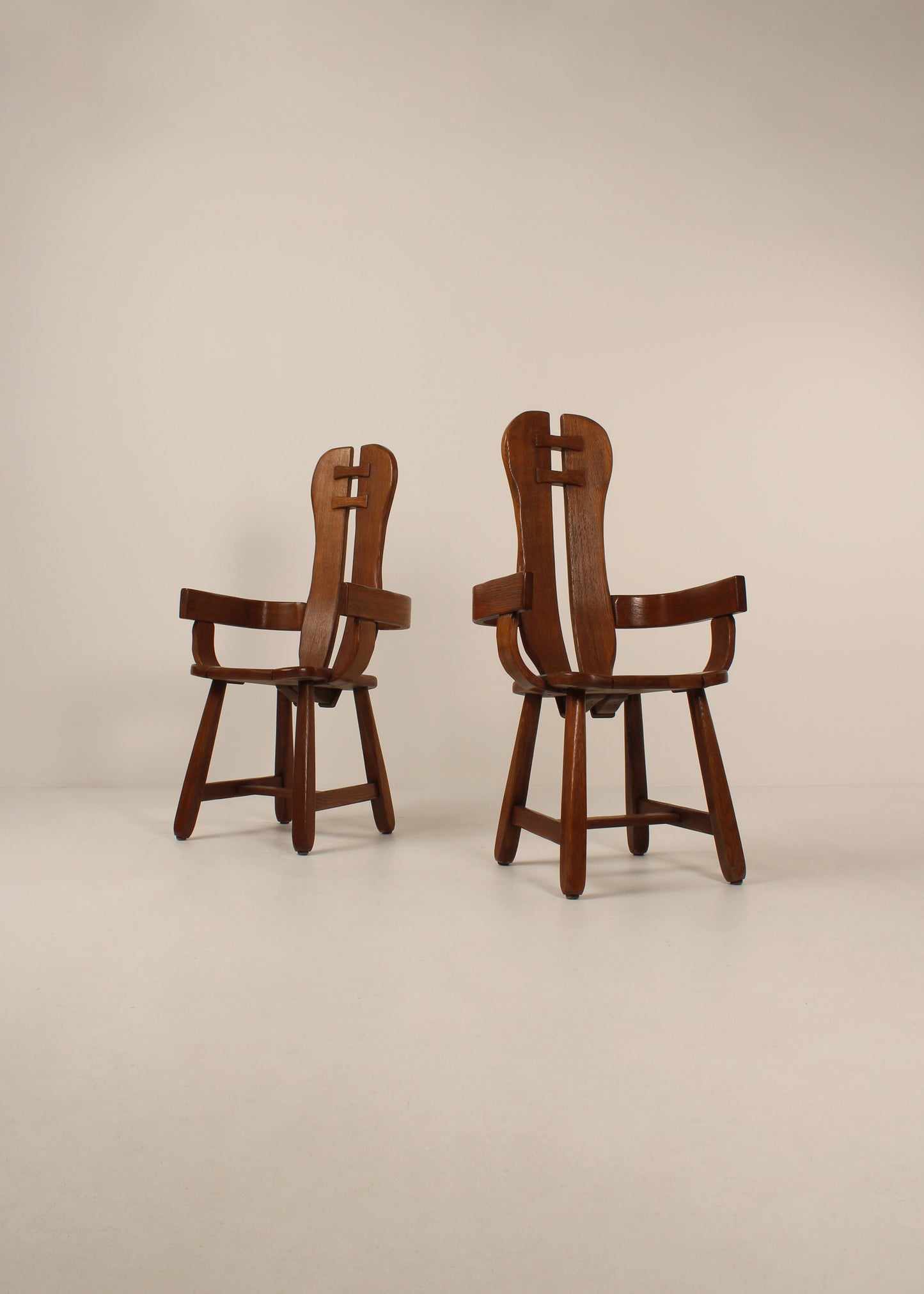 Pair of oak De Puydt dinging chairs with arms, Mid - Century