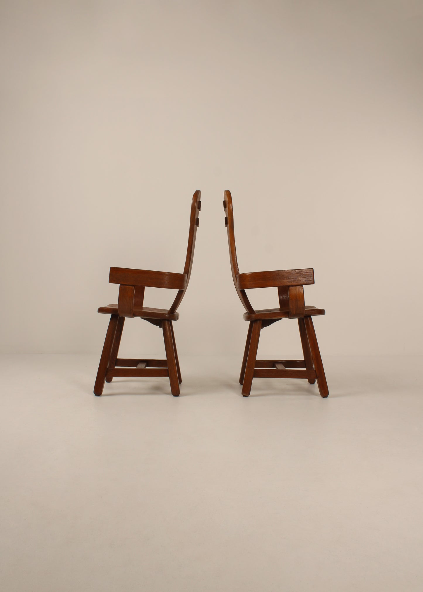 Pair of oak De Puydt dinging chairs with arms, Mid - Century