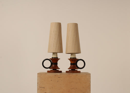 Pair circular handle table lamps, ebonized wooden rings