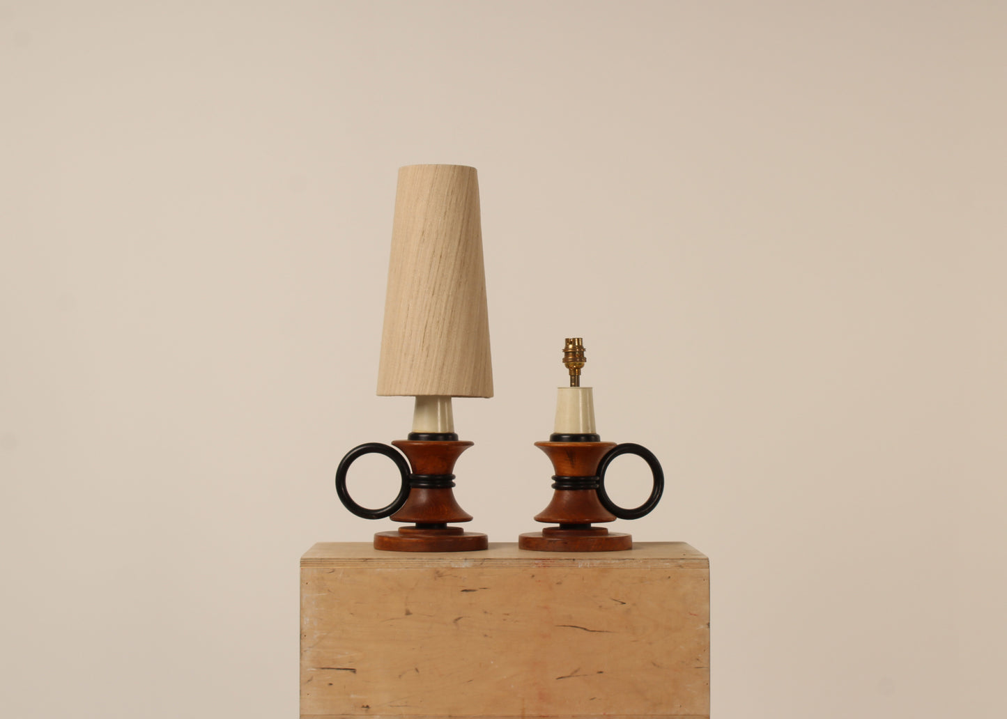 Pair circular handle table lamps, ebonized wooden rings