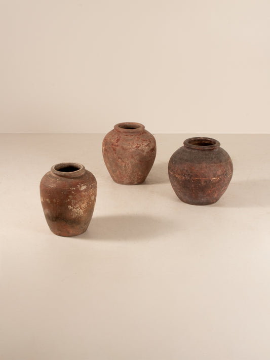 Set of three Asian water pots