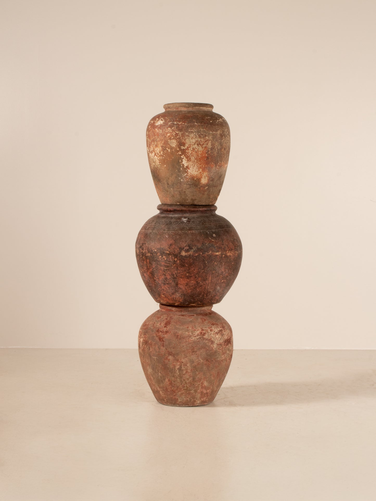 Set of three Asian water pots